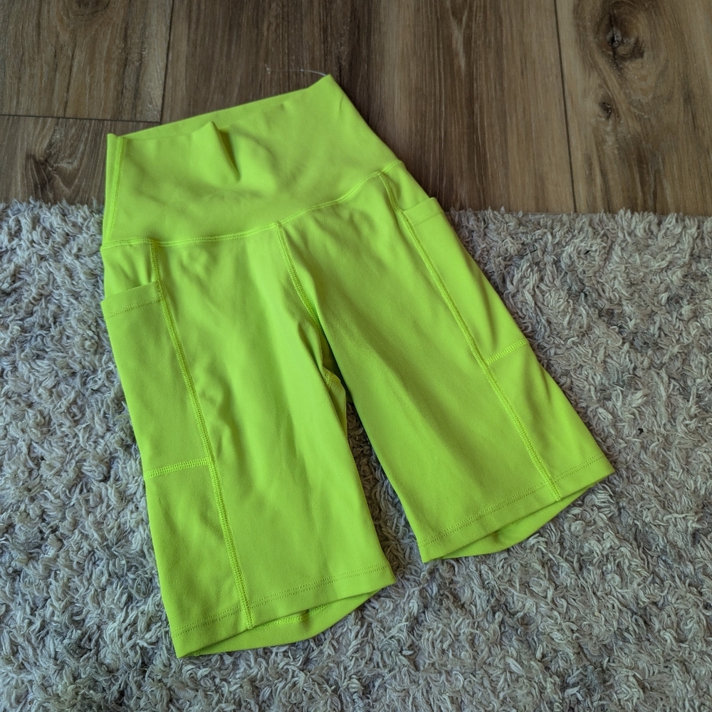 Free people neon yellow bike shorts with pockets